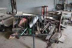 METAL TABLE WITH VISE AND SCRAP METAL (TABLE 5'6"x2'9")