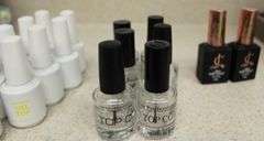 VARIOUS BOTTLES OF TOP COAT