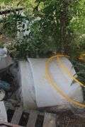 LOUNGE CHAIRS, SHADE CANOPY; YELLOW GAS PVC PIPE