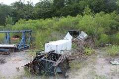 All unlotted scrap on property, to be removed within 30 days by buyer.