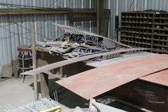 24' LONG 4' WIDE METAL TABLE WITH CONTENTS UNDER TABLE