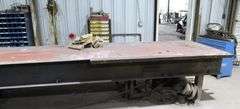 24' LONG 4' WIDE METAL TABLE WITH CONTENTS UNDER TABLE