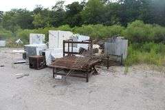 All unlotted scrap on property, to be removed within 30 days by buyer.
