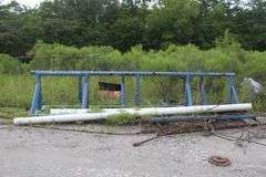 SET OF TWO PIPE RACKS WITH PVC PIPE AS PHOTOGRAPHED