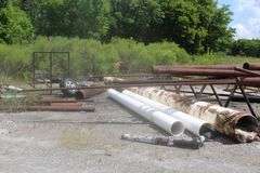 2- PIPE RACK WITH CONTENTS IN BACK LEFT OF YARD