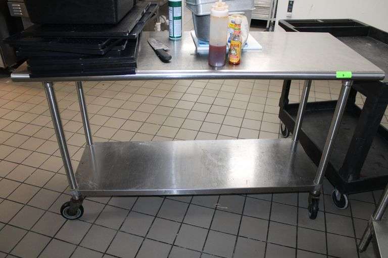 5’ STAINLESS STEEL TABLE ON WHEELS