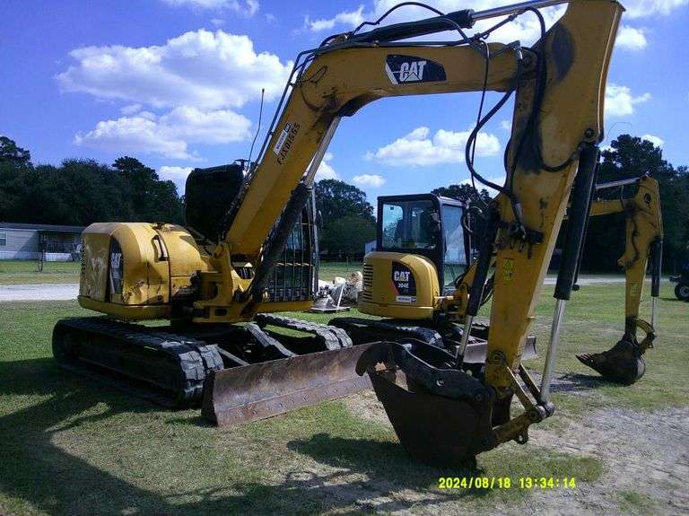 Cat Trackhoe 308E  Runs and operates