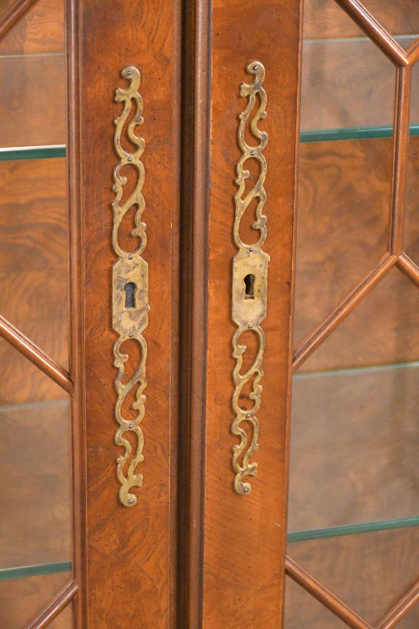 Large burl walnut arch top curio cabinet with 2 glass doors