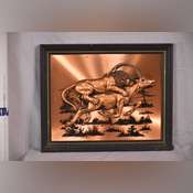 Small copper colored 3-D artwork of lion attacking a gazelle; 697