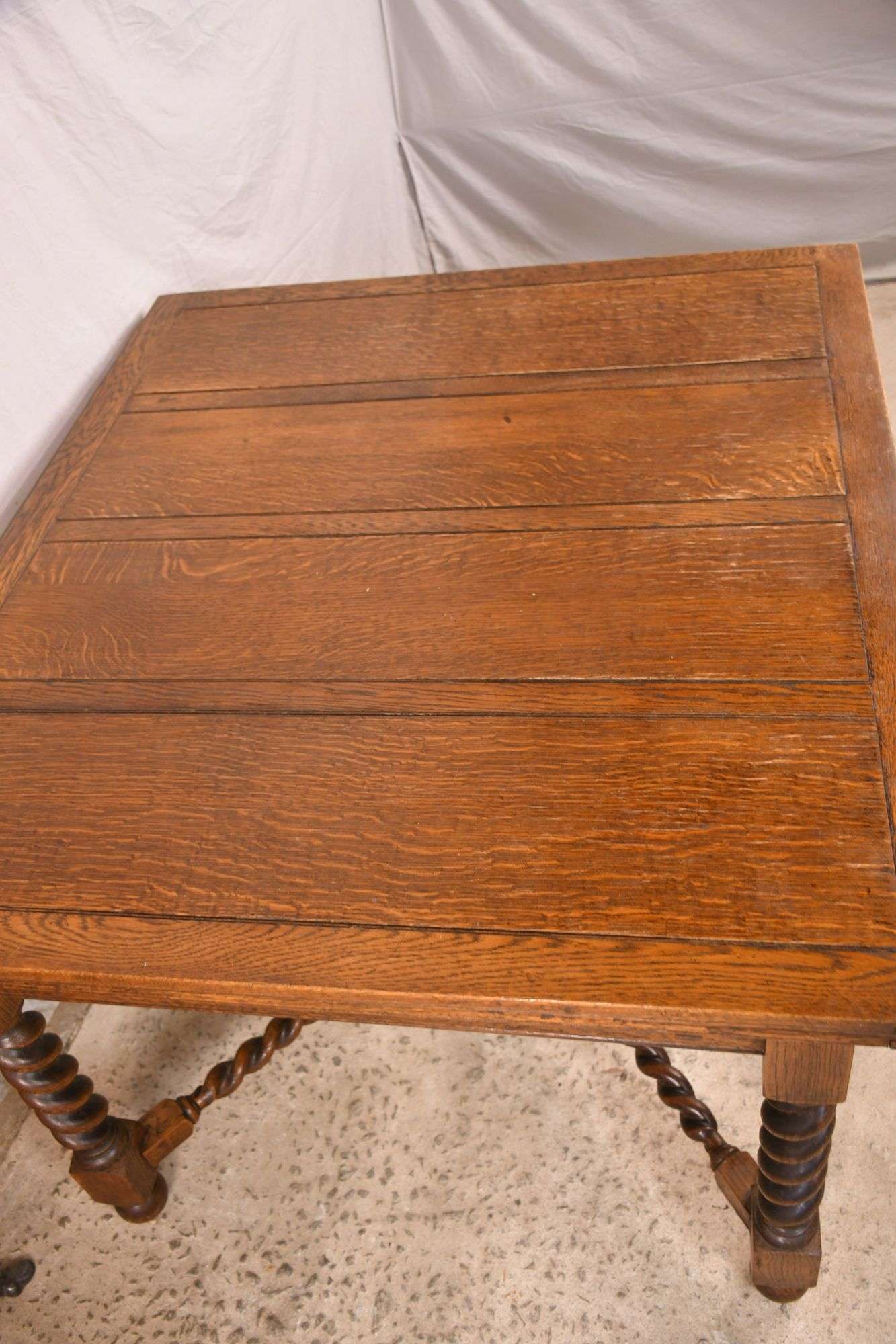 Oak draw leaf dining/pub table with barley twist legs and stretchers; 876-109 - R.H. Lee & Co. Auctioneers