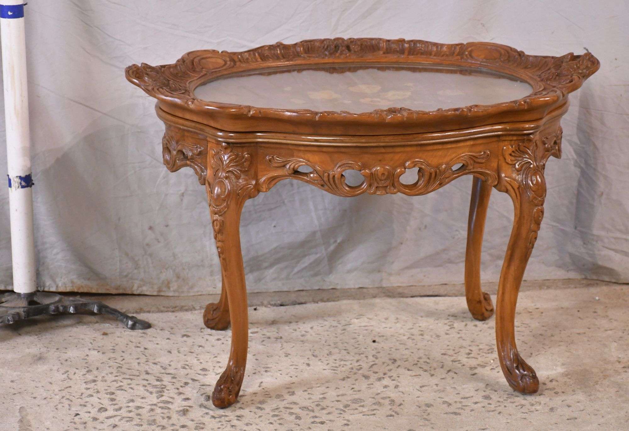 Inlaid carved walnut French style coffee table with removable