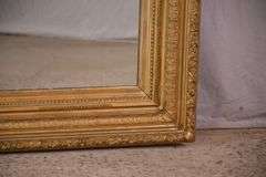 Large mirror with ornate gold frame; 971-158