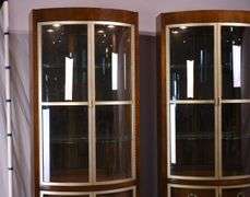 Pair of Century "Omni Bunching" bowfront curio cabinets; 68-5909