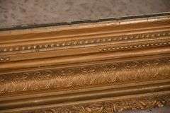 Large mirror with ornate gold frame; 971-158
