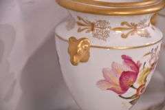 Set of 4 Chelsea House small porcelain urns with floral designs; 15961-239