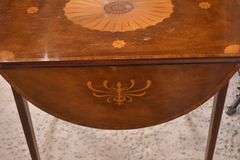 Baker inlaid mahogany single drawer drop-leaf side table; 68-5197