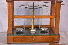 Becker Brothers balance scales in mahogany and glass single drawer case; 697-1435