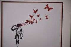 Framed print "Butterfly Girl Suicide" by Banksy; 975-1536