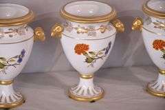 Set of 4 Chelsea House small porcelain urns with floral designs; 15961-239