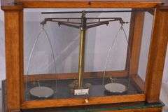 Becker Brothers balance scales in mahogany and glass single drawer case; 697-1435