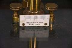 Becker Brothers balance scales in mahogany and glass single drawer case; 697-1435