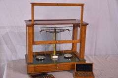 Becker Brothers balance scales in mahogany and glass single drawer case; 697-1435