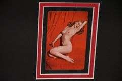 Pair of framed playing cards featuring nude Marilyn Monroe scenes by Tom Kelly; 975-1573