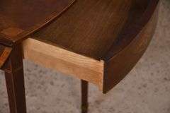 Baker inlaid mahogany single drawer drop-leaf side table; 68-5197
