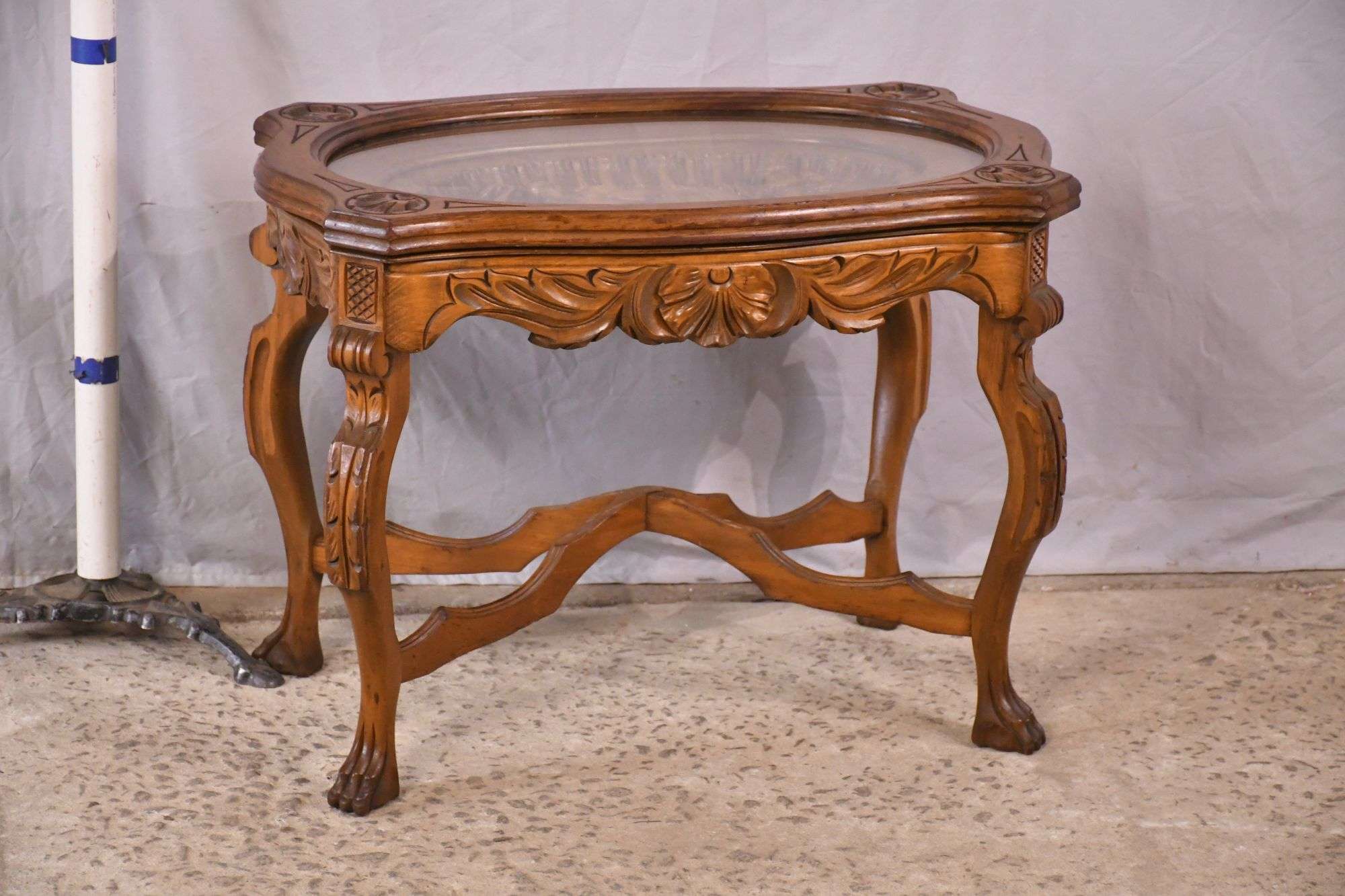 Carved coffee table with glass tray top; 15752-010 - R.H. Lee & Co