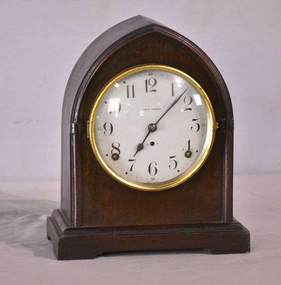 Seth Thomas clock with convex glass door and mahogany case; 6117-016