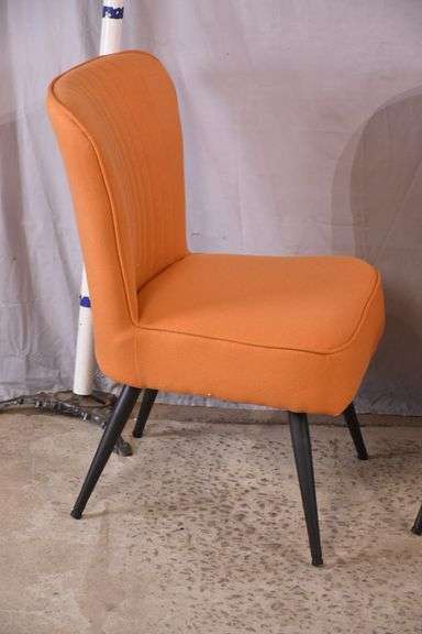 Pair of mid-century style chairs with orange fabric and black metal legs; 1116-480