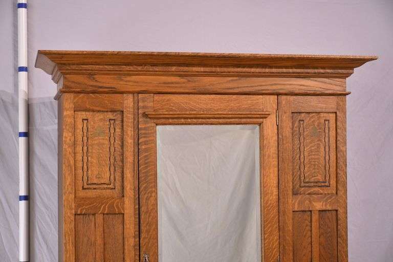 Inlaid oak 3 part armoire with beveled mirror door; 55-11191
