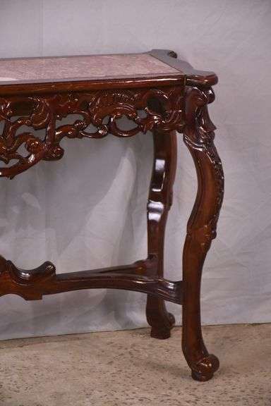 Carved mahogany console table with pink marble top; 495-318