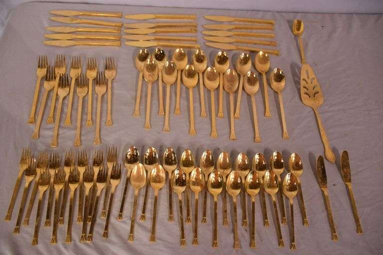 SRI "Royalty" gold toned stainless flatware set; 14-2666