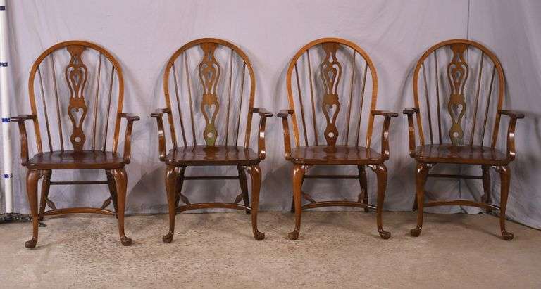 Set of 4 Pennsylvania House cherry Windsor style open arm chairs with stretcher bases; 155-825