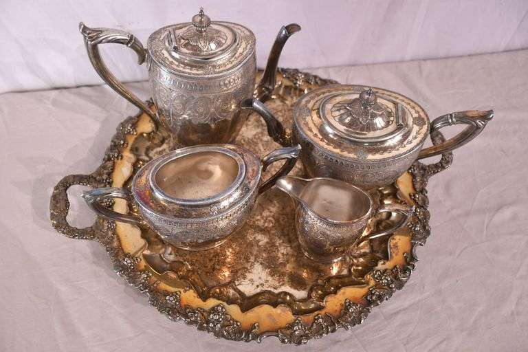 Philip Ashberry & Sons 4 piece silverplate tea and coffee service with ornate round serving tray; 1054-1304