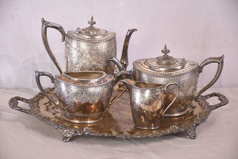 Philip Ashberry & Sons 4 piece silverplate tea and coffee service with ornate round serving tray; 1054-1304