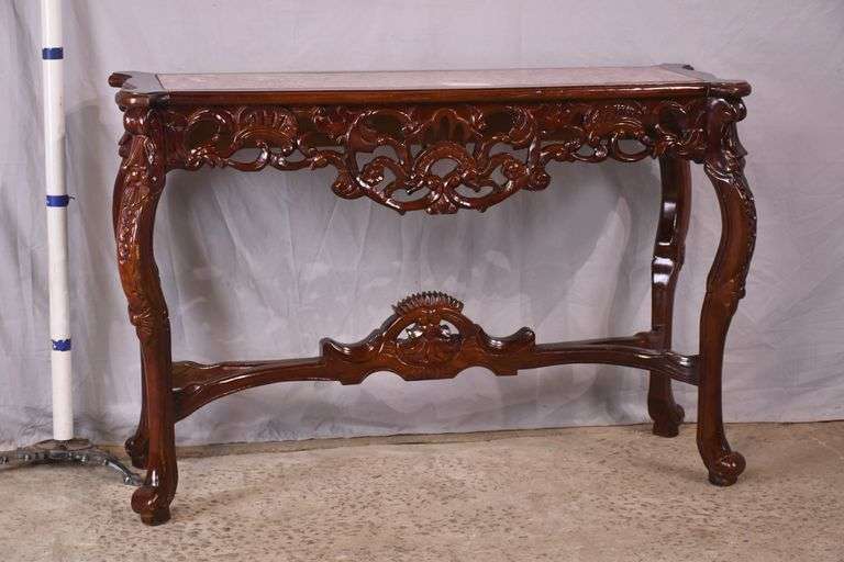 Carved mahogany console table with pink marble top; 495-318