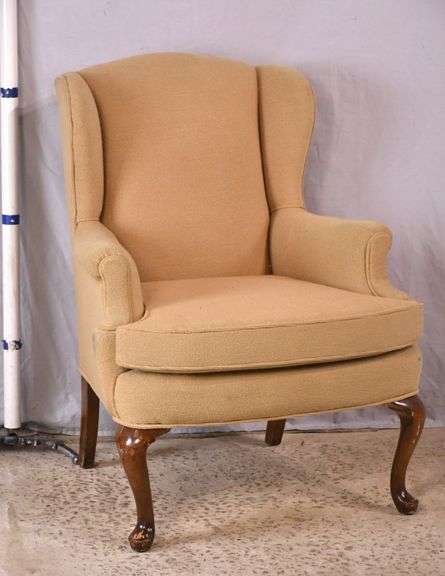 Upholstered Queen Anne style wingback armchair; 55-11179