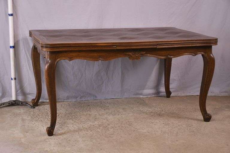Oak French style draw-leaf dining table with parquet top; 495-328
