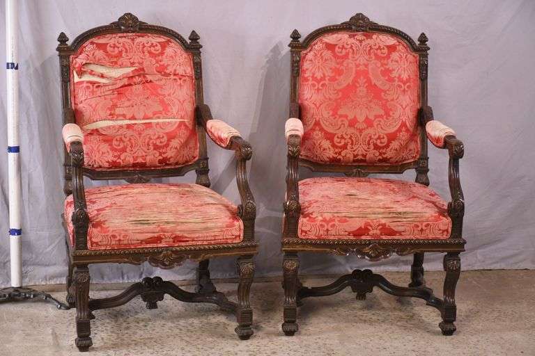 Pair of carved walnut open armchairs; 68-5084
