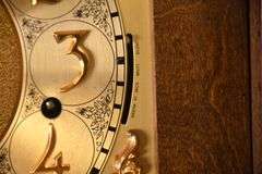 Howard Miller grandfather clock with oak case; 16748-006