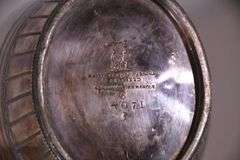 Philip Ashberry & Sons 4 piece silverplate tea and coffee service with ornate round serving tray; 1054-1304