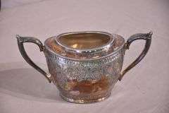 Philip Ashberry & Sons 4 piece silverplate tea and coffee service with ornate round serving tray; 1054-1304