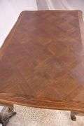 Oak French style draw-leaf dining table with parquet top; 495-328