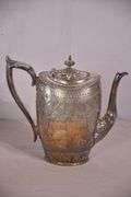 Philip Ashberry & Sons 4 piece silverplate tea and coffee service with ornate round serving tray; 1054-1304