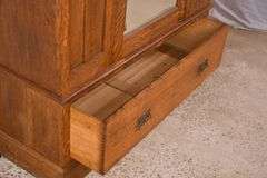 Inlaid oak 3 part armoire with beveled mirror door; 55-11191