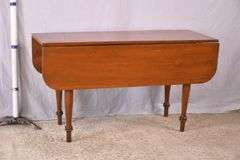Early pine drop-leaf harvest table with turned legs; 155-816