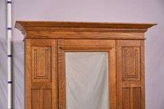 Inlaid oak 3 part armoire with beveled mirror door; 55-11191