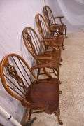 Set of 4 Pennsylvania House cherry Windsor style open arm chairs with stretcher bases; 155-825